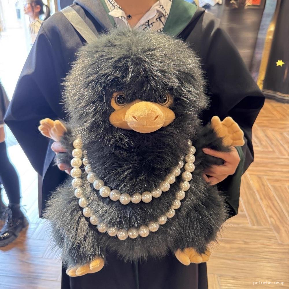 Peluche Niffleur Animaux Fantastiques avec Collier de Perles