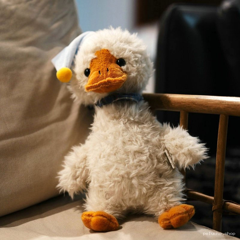 Peluche Canard Dormeur en Bonnet de Nuit - Douceur Réconfortante