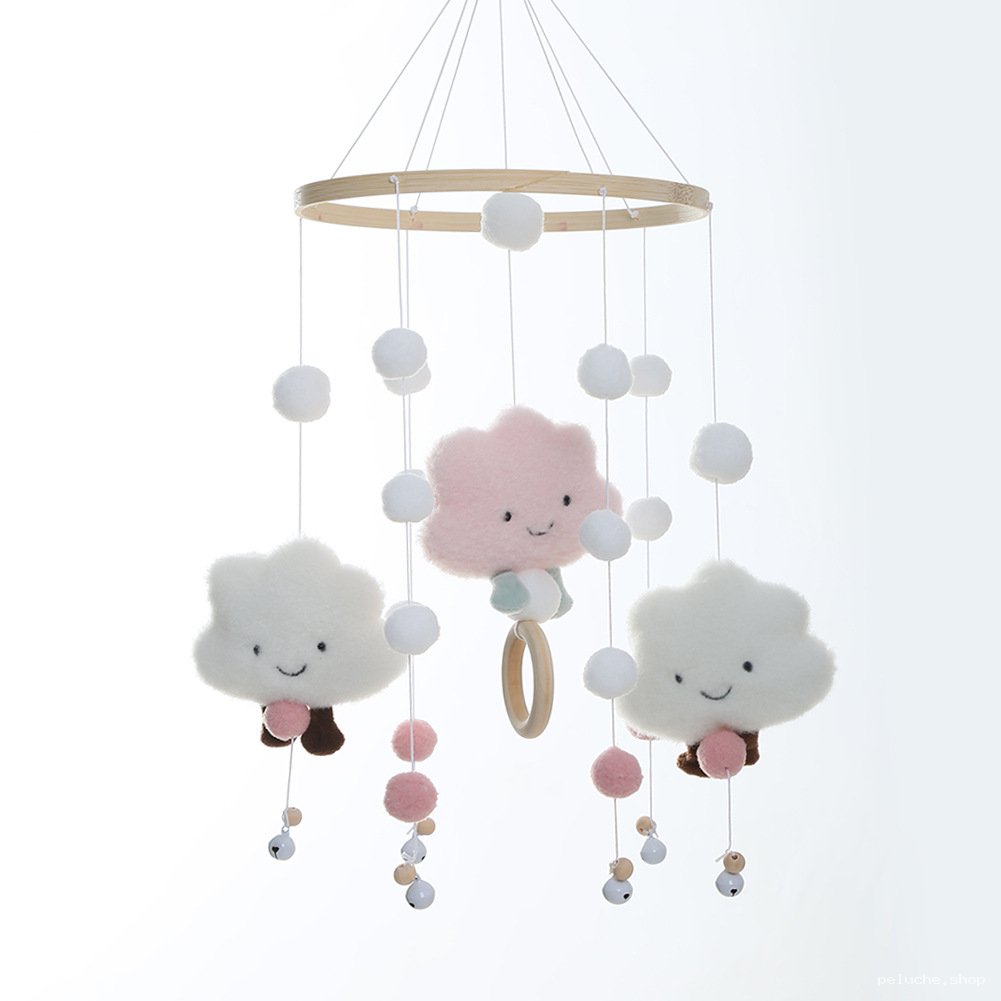 Mobile musical bébé nuages et pompons - Douceur et rêve