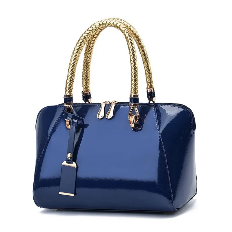 Sac à main bleu marine laqué | Anses dorées tressées chic