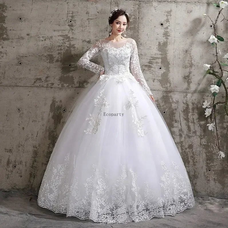 Robe de Mariée Princesse Blanche Dentelle Manches Longues Élégante