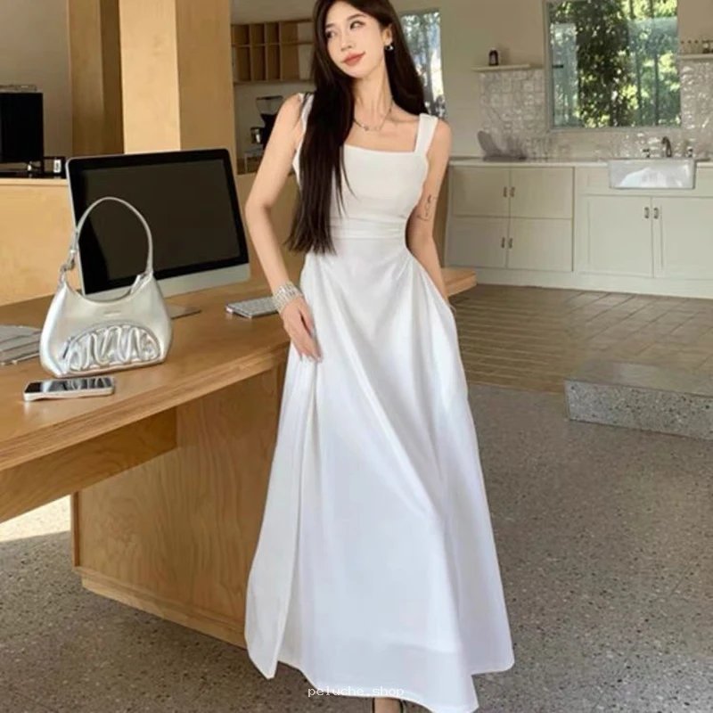 Robe longue blanche chic élégante sans manches pour femme